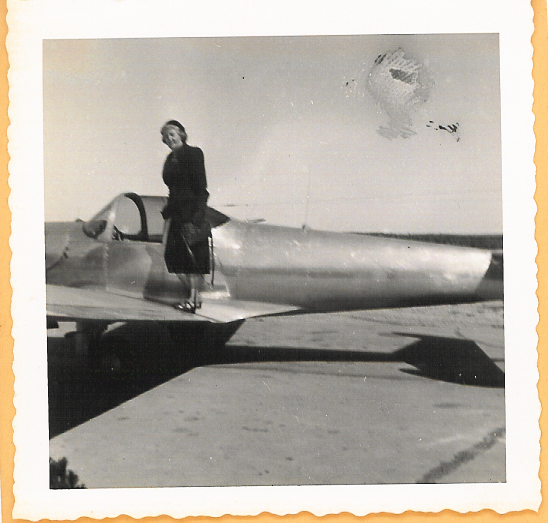 Mildred Devine Hurt, mother of Doris Hurt, with her Ercoupe plane, 1946
